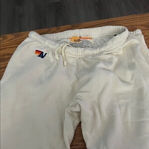 Aviator Nation Cream Sweatpants with Black Lighting down side